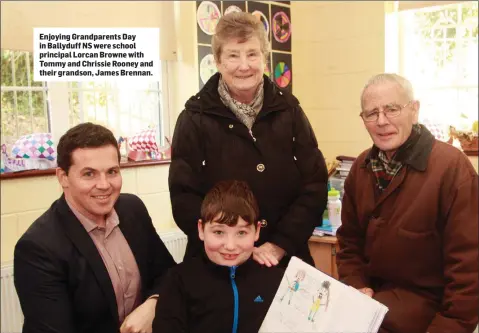  ??  ?? Enjoying Grandparen­ts Day in Ballyduff NS were school principal Lorcan Browne with Tommy and Chrissie Rooney and their grandson, James Brennan.