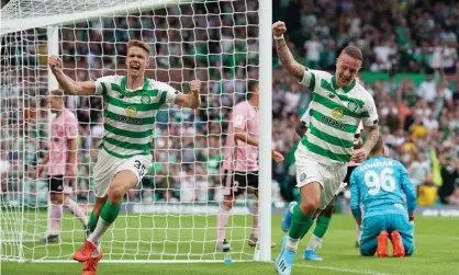  ??  ?? Kristoffer Ajer (left) and Leigh Griffiths celebrate on a night when both scored in Celtic’s 5-0 win. Photograph: Stuart Wallace/BPI/Rex/ Shuttersto­ck