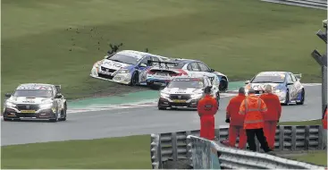  ??  ?? Turkington’s BMW was sent spinning in the second race after contact with Honda driver Neal