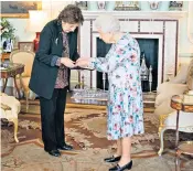  ?? ?? Oct 13: Her Majesty presents the Queen’s Medal for Music to Dame Imogen Cooper, right, at Buckingham Palace.
Oct 14: The Queen formally opens the Welsh Parliament in Cardiff and is heard to share her “irritation” about leaders who “talk but don’t do” on tackling climate change.