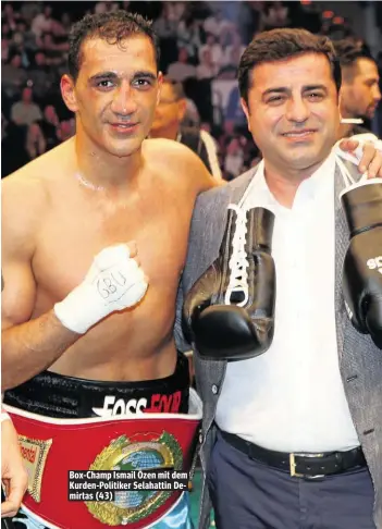  ??  ?? Box-Champ Ismail Özen mit dem Kurden-Politiker Selahattin Demirtas (43)