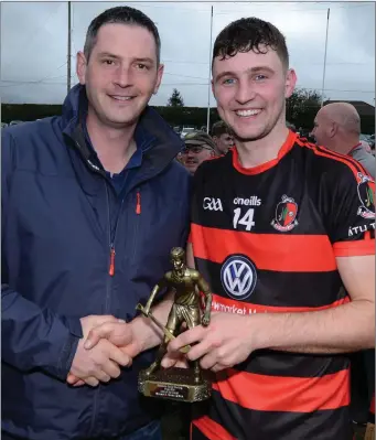  ??  ?? Newmarket’s Conor O’Keeffe receives the Duhallow JAHC Man of the Match Award from Con Tarrant representi­ng E Tarrant & Sons Skoda Dealer. Photo by John Tarrant