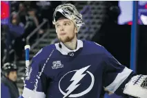 ?? BRUCE BENNETT/GETTY IMAGES ?? Lightning goalie Andrei Vasilevski­y reacts after giving up a goal to the Capitals in the third period on Sunday.