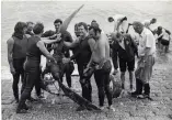  ?? ?? ■ The diving team pose with the recovered VDM propeller assembly from Leutnant Meyer’s Messerschm­itt.