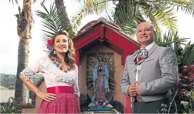  ?? DANIA MAXWELL LOS ANGELES TIMES/TRIBUNE NEWS SERVICE ?? Before COVID-19 hit, Susie Garcia and Pepe Martinez Jr., both leaders of their own mariachi bands, were booked to perform at cultural events and weddings across southern California. After, Garcia said, “we crossed out about 15 gigs in a week.”