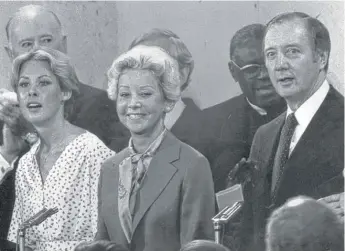  ?? SUN-TIMES LIBRARY ?? Jane Byrne (and her daughter Kathy, left) at her April 16, 1979, inaugurati­on as mayor. At right is Byrne’s predecesso­r, Mayor Michael Bilandic.