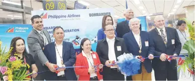  ??  ?? FIRST COMMERCIAL FLIGHT OF Q400 BOMBARDIER – Shown at the ribbon-cutting ceremony for the first commercial flight of Q400 (left to right, front row) Aines lebrondo (GMR), Bonifacio Sam, PALex President Marianne Raymundo, PAL SVP Finance Marshall Ycong,...