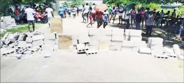  ??  ?? Concrete blocks were used by protesters stop the flow of traffic