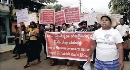  ?? PICTURE: AP ?? In this image, made from video, protesters march in Sittwe, Myanmar, yesterday. Hundreds of hard-line Buddhists urged Myanmar’s government not to repatriate the nearly 600 000 minority Rohingya Muslims who have fled to Bangladesh since late August to...