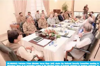  ??  ?? ISLAMABAD: Pakistan Prime Minister Imran Khan (left) chairs the National Security Committee meeting in Islamabad. Fears of an impending curfew in the disputed region of Kashmir ratcheted up tensions yesterday, as nuclear rivals India and Pakistan traded accusation­s of military clashes at the de facto border. — AFP