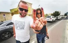  ?? Antonin Kélian Kallouche/Gulf News ?? Philippe Samaha and his sister Cynthia after voting in Dubai.