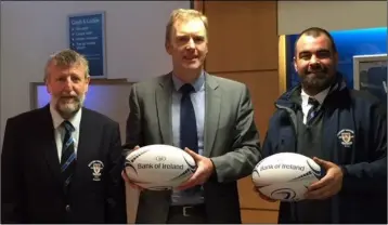  ??  ?? Andrew Owen, Manager, Bank of Ireland Wexford, presents match balls to Herbie Honohan (club President) and Aidan Stewart (club captain) of Wexford R.F.C. before their game against Balbriggan.