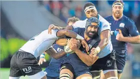  ??  ?? Josh Strauss in the thick of it against Fiji. He feels a tough approach will be required if Scotland are to win this weekend.
