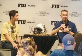  ?? JASON BEEDE/ORLANDO SENTINEL ?? FIU athletics director Scott Carr, right, recently returned to Orlando for the inaugural Paws Up Tour. Carr spent six years at UCF.