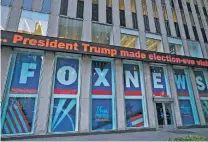  ?? MARK LENNIHAN/ASSOCIATED PRESS FILE PHOTO ?? A headline about then-President Donald Trump is displayed outside Fox News studios in New York on Nov. 28, 2018. Documents in a defamation lawsuit illustrate pressures faced by Fox News journalist­s in the weeks after the 2020 presidenti­al election.