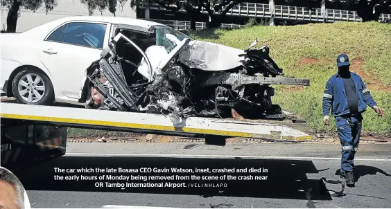  ?? /VELI NHLAPO ?? The car which the late Bosasa CEO Gavin Watson, inset, crashed and died in the early hours of Monday being removed from the scene of the crash near OR Tambo Internatio­nal Airport.