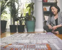  ?? ?? Holly Cisneros looks at the dozens of needles she used in her IVF treatments in Rebecca Campbell's documentar­y The Secret Society.
