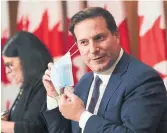  ?? SEAN KILPATRICK THE CANADIAN PRESS ?? Public Safety Minister Marco Mendicino said Wednesday that he’s ready to work with every level of government on banning handguns.