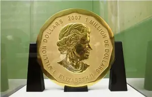  ?? — AP ?? Precious relic: The ‘Big Maple Leaf’ coin on display at the Bode Museum in
Berlin.