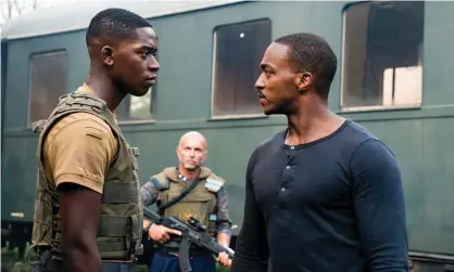  ?? Photograph: Jonathan Prime/Netflix ?? Damson Idris and Anthony Mackie in Outside the Wire