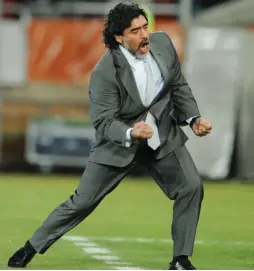  ?? AFP/ FRANÇOIS-XAVIER MARIT ?? Maradona. then Albicelest­e coach, celebrates a goal at the 2010 World Cup.