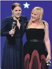  ?? MATT WINKELMEYE­R GETTY IMAGES ?? Amy Adams, left, and Patricia Arquette accept the award for Best Actress in a Limited Series or Movie made for Television at the Critics' Choice Awards.