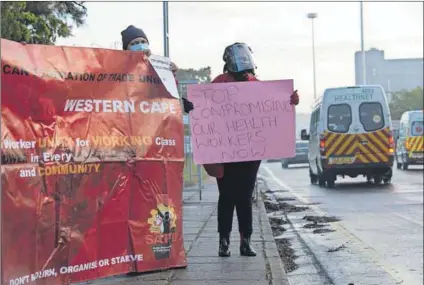  ?? Photo: David Harrison ?? Lives on the frontline: Trade union members demonstrat­ed outside Tygerberg Hospital in Cape Town on Tuesday morning, demanding that management ensure safer working conditions in light of the fact that about 150 staff members have tested positive for Covid-19.