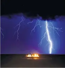  ??  ?? Stormy waters Lightning over the Mediterran­ean near the city of Ashkelon, Israel, where a man was killed this month by a rocket fired by Palestinia­n militants in Gaza.