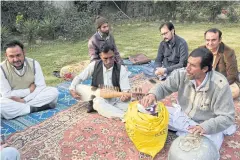  ??  ?? RIGHT
Akhtar Gul plays a traditiona­l rabab in Peshawar in northweste­rn Pakistan. Public musical performanc­es were banned for years when the Taliban held sway over the region and neighbouri­ng Afghanista­n.