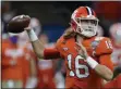  ?? JOHN BAZEMORE - THE ASSOCIATED PRESS ?? FILE - In this Friday, Jan. 1, 2021 file photo, Clemson quarterbac­k Trevor Lawrence passes against Ohio State during the first half of the Sugar Bowl NCAA college football game in New Orleans.