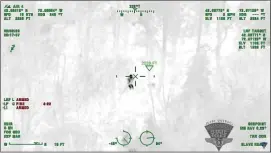  ?? COURTESY — MASSACHUSE­TTS STATE POLICE ?? The 70-year-old man rescued from the Granville State Forest Thursday evening as seen in the State Police helicopter’s Forward Looking Infrared (FLIR) camera.