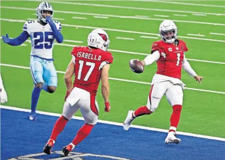  ?? [TIM HEITMAN/USA TODAY SPORTS] ?? Arizona quarterbac­k Kyler Murray stretches the football across the goal line for a touchdown against Dallas on Monday. The former OU superstar has taken big steps forward in his second NFL season, most notably with his running game.