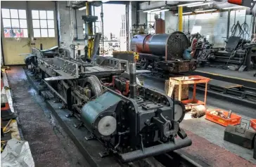  ?? JOEY EVANS ?? The shape of new double Fairlie James Spooner takes shape inside the FR’s Boston Lodge workshops on June 22. Under restoratio­n ‘Large England’ Welsh Pony, which incorporat­es significan­t new-build elements
(see panel) stands in the background.