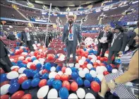  ??  ?? CELEBRATIO­N: Delegates leave after the convention speech.