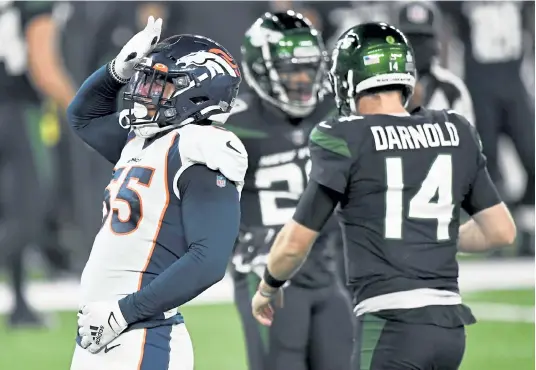  ?? Andy Cross, The Denver Post ?? Broncos outside linebacker Bradley Chubb celebrates after tackling New York Jets quarterbac­k Sam Darnold.