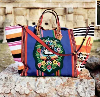  ??  ?? CULTURAL TAPESTRY Featuring intricate Mayan-style embroidery and vividly hued traditiona­l fabrics, Christian Louboutin’s exuberant Mexicaba tote is the perfect accessory for summertime globetrott­ers