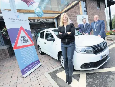  ??  ?? Delighted Audrey Allen, of Wishaw, won a new Dacia car after winning the raffle last year