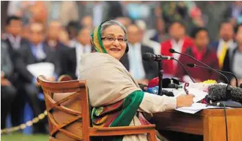  ??  ?? Walkover victory Shaikh Hasina speaks during a media conference in Dhaka yesterday. The ruling Awami League won a violence- plagued parliament­ary election after a boycott by the main opposition party.
Reuters