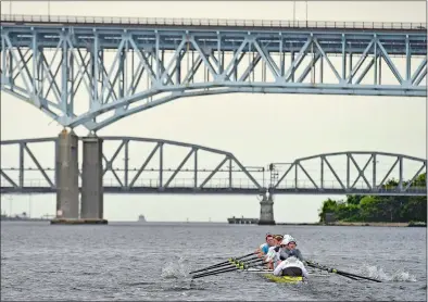  ?? SEAN D. ELLIOT/ THE DAY ?? The Yale University heavyweigh­t crew works out on the Thames River last year three days before defeating rival Harvard for the fifth straight year in the 154th rowing of the Harvard-Yale Regatta. The 2020 meeting, scheduled for Saturday, was canceled this spring due to the coronaviru­s pandemic, the first time the race won’t be held since 1945, coinciding with World War II.