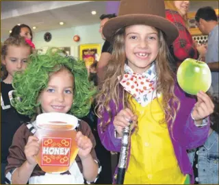  ??  ?? Mia and Amelie Melzack are suitably dressed for a “Secret Cinema” screening of