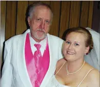  ?? COURTESY OF MARY BANKS ?? Mary Banks, right, is pictured with her father, Ricky Wallace, during her wedding in 2010. Banks, who is a social worker for Caring Hands Hospice in Batesville, started a grief support group for families in the Batesville area. Banks’ father, who died in May 2018, used hospice care. She started working in hospice care in July 2018.