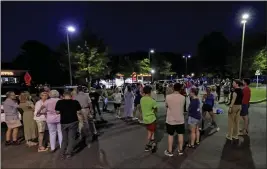  ?? BUTCH DILL — THE ASSOCIATED PRESS Stephen's Episcopal ?? Church members gather for a prayer circle after a shooting at St. Church in Vestavia Hills, Ala., on Thursday.