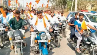  ??  ?? TRS Andole legislator Chanti Kranti Kiran sets out in a motorcycle procession to raise funds for Ram temple in Ayodhya, on Tuesday.