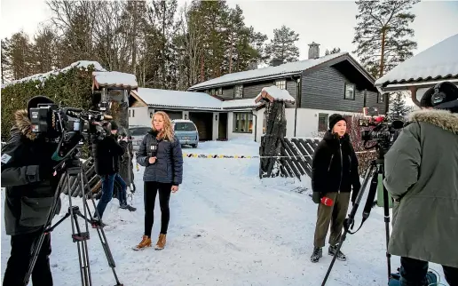  ?? AP ?? Members of the media report from outside the home of missing woman Anne-elisabeth Falkevik Hagen, the wife of one of Norway’s richest men, Tom Hagen, in Fjellhamar, Norway.