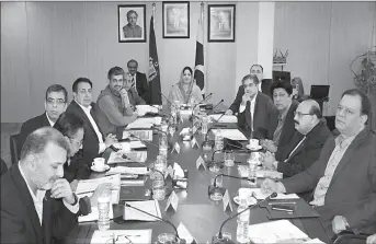  ?? ISLAMABAD
-APP ?? Minister of State for IT & Telecom, Anusha Rahman chairing 57th board of directors meeting of USFCO.