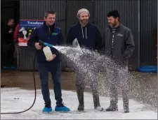  ??  ?? Frank and Joe Keane, Lixnaw, with John Lynch, general manager of Kelliher’s FA, Ballymulle­n, Tralee, demonstrat­ing the Kenocox Foaming System at the recent farm informatio­n days.