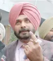  ?? — AFP ?? Navjot Singh Sidhu, cricketer-turnedpoli­tician and current Congress candidate, after casting his vote in Amritsar.