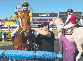  ?? Picture: SUPPLIED ?? Robbers Cobber and Matthew McGuren after winning the Divine Prophet Class 3 Handicap (1800m) at the Gold Coast on Saturday.