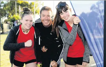  ??  ?? COMMITTED: Rachel Hateley, right, will participat­e in her 100th Wimmera River parkrun, as the event marks the milestone on Saturday. She is pictured with family members Sarah and Trevor, who are also heavily involved in the event. Picture: PAUL CARRACHER