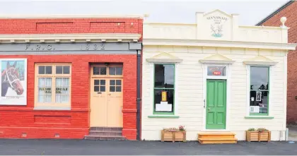  ?? ?? The Manawatu¯ Herald (right) and Foxton Racing Club buildings, as restored by Jim and Sarah Harper.